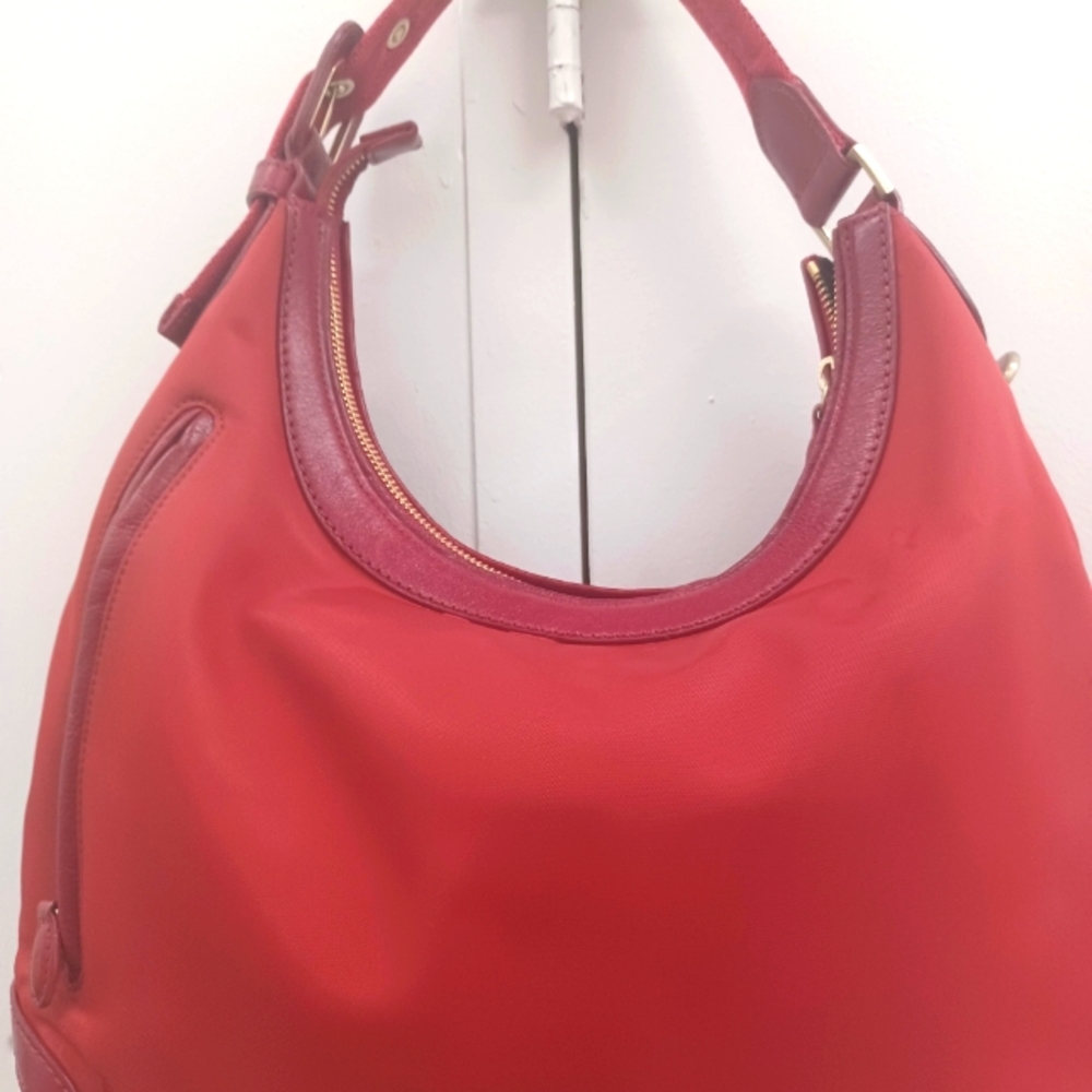 Tumi red women handbag satchel